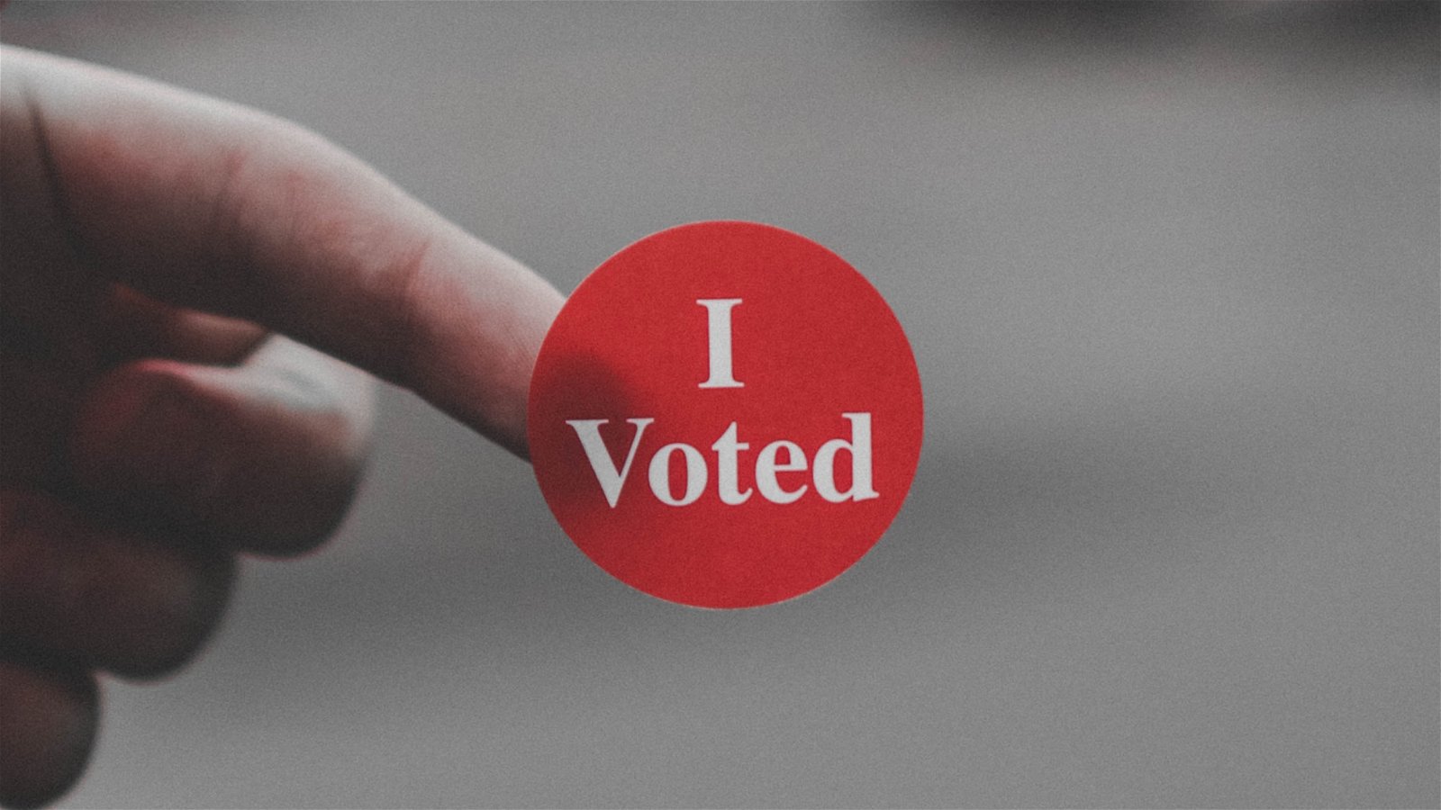 Someone Holding "I Voted" Sticker 